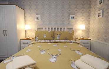 A Bedroom at the Arrandale Apartment, Inverness